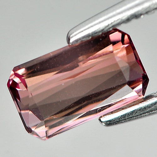 Natural Orangish Pink Tourmaline Gemstones 0.91 Ct. Clean Octagon Shape 7 x 4.2 Mm.: Product ID: 807242709 Product Name: Natural Tourmaline Weight: 0.91 CT. Size: 7 x 4.2 x 3.3 MM. Shape: Octagon Color: Orangish Pink Clarity:VSI Luster: Good Gems Origin: Nigeria Treatment: Unheated Cr