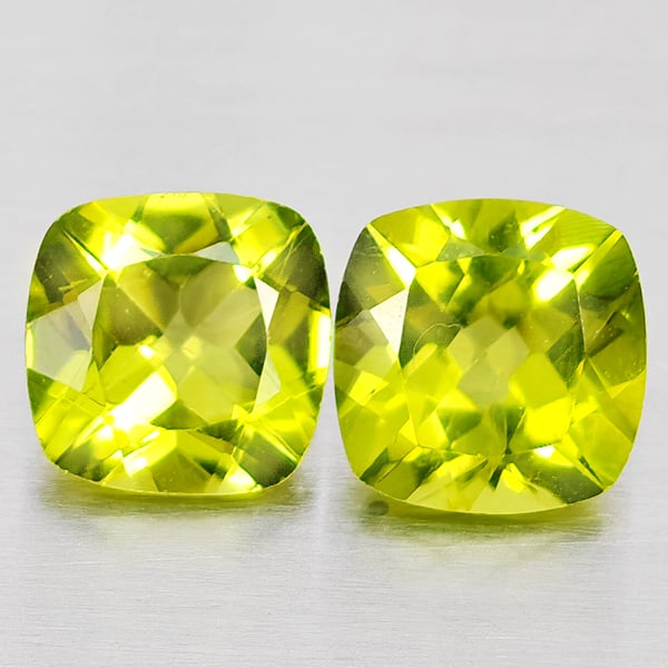 Natural Green Peridot Gemstones 1.85 Ct. 2Pcs Cushion Shape 6.1 Mm.: Product ID: 805317373 Product Name: Natural Peridot Weight: 1.85 CT. Size: 6.1 x 6.1 x 3.8 MM. Shape: Cushion Shape Color: Green Clarity:VSI - SI1 Luster: Good Gems Origin: Pakistan Treatment: Unheate