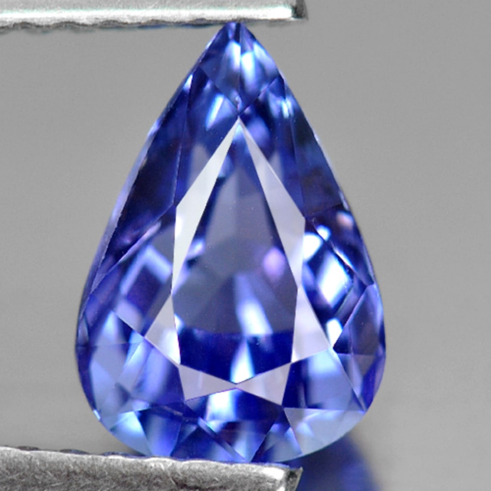 Natural Blue Tanzanite Gemstones 1.53 Ct. Clean Pear Shape 8.6 x 6 Mm.: Product ID: 807006312 Product Name: Natural Tanzanite Weight: 1.53 CT. Size: 8.6 x 6 x 4.8 MM. Shape: Pear Color: Violetish Blue Clarity:IF Luster: Very Good Gems Origin: Tanzania Treatment: Heated Cr