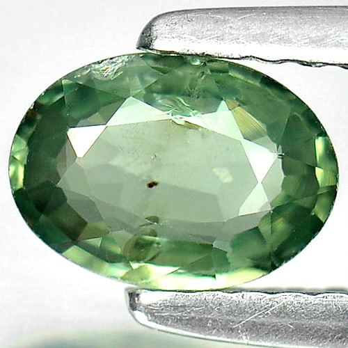 Natural Green Songea Sapphire Gemstones 0.72 Ct. Oval Shape 6.7 x 4.9 Mm.: Product ID: 806135305 Product Name: Natural Green Sapphire Weight: 0.72 CT. Size: 6.7 x 4.9 x 2.3 MM. Shape: Oval Color: Green Clarity:SI Luster: Good Gems Origin: Tanzania Treatment: Heated Crystal S