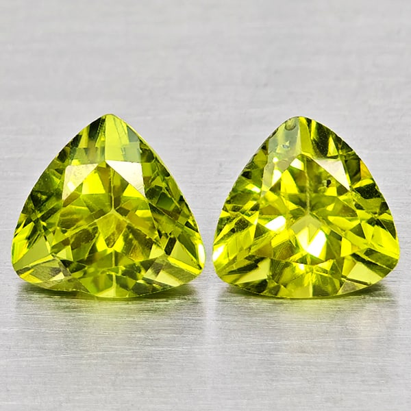 Natural Green Peridot Gemstones 1.64 Ct. 2 Pcs Trilliant Shape 6 Mm.: Product ID: 805317555 Product Name: Natural Peridot Weight: 1.64 CT. Size: 6 x 6 x 4.4 MM. Shape: Trilliant Color: Green Clarity:SI1 Luster: Good Gems Origin: Pakistan Treatment: Unheated Crystal Stru