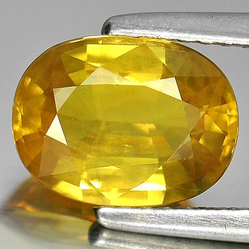 Natural Yellow Sapphire Gemstones 2.46 Ct. Oval Shape 9.2 x 6.9 Mm.: Product ID: 806149915 Product Name: Natural Yellow Sapphire Weight: 2.46 CT. Size: 9.2 x 6.9 x 4.1 MM. Shape: Oval Color: Yellow Clarity:SI Luster: Good Gems Origin: Thailand Treatment: Heated Crystal