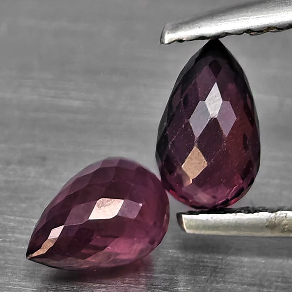 Natural Purplish Pink Rhodolite Garnet 1.71 Ct. 2 Pcs. Briolette Shape 6.1 x 4.1 Mm.: Product ID: 802937866 Product Name: Natural Rhodolite Weight: 1.71 CT. Size: 6.1 x 4.1 MM. Shape: Briolette Color: Purplish Pink Clarity:SI1 Luster: Good Gems Origin: Madagascar Treatment: Unheated Cr