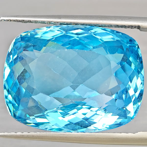 Natural Baby Blue Topaz Gemstones 23.98 Ct. VVS Cushion Shape 18.7 x 14.4 Mm.: Product ID: 807168490 Product Name: Natural Blue Topaz Weight: 23.98 CT. Size: 18.7 x 14.4 x 10.3 MM. Shape: Cushion Shape Color: Baby Blue Color Clarity:VVS - VSI Luster: Very Good Gems Origin: Brazi