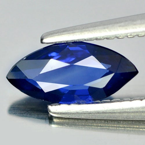 Natural Blue Sapphire Gemstones 0.56 Ct. Marquise Shape 7.8 x 3.8 Mm.: Product ID: 806009266 Product Name: Natural Blue Sapphire Weight: 0.56 CT. Size: 7.8 x 3.8 x 2.4 MM. Shape: Marquise Color: Blue Clarity:VSI Luster: Good Gems Origin: Thailand Treatment: Heated Crysta
