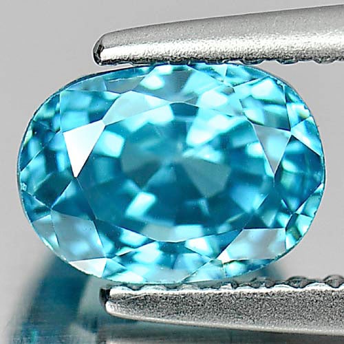 Natural Blue Zircon Gemstones 2.47 Ct. Oval Shape 7.2 x 5.4 Mm.: Product ID: 807730247 Product Name: Natural Zircon Weight: 2.47 CT. Size: 7.2 x 5.4 x 5.6 MM. Shape: Oval Color: Blue Clarity:VVS Luster: Very Good Gems Origin: Cambodia Treatment: Heated Crystal Stru