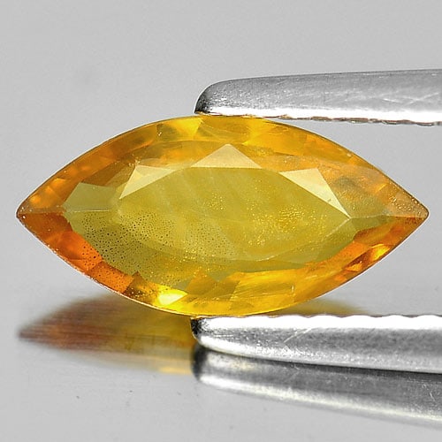 Natural Yellow Sapphire Gemstones 0.95 Ct. Marquise Shape 10.2 x 5 Mm.: Product ID: 806158693 Product Name: Natural Yellow Sapphire Weight: 0.95 CT. Size: 10.2 x 5 x 2 MM. Shape: Marquise Color: Yellow Clarity:SI1 Luster: Good Gems Origin: Thailand Treatment: Heated Cryst