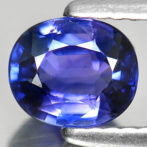 Natural Purplish Blue Sapphire Gemstones 1.01 Ct. Oval Shape 6.7 x 5.7 Mm.: Product ID: 806006325 Product Name: Natural Blue Sapphire Weight: 1.01 CT. Size: 6.7 x 5.7 x 3.3 MM. Shape: Oval Color: Purplish Blue Clarity:VSI Luster: Very Good Gems Origin: Madagascar Treatment: H