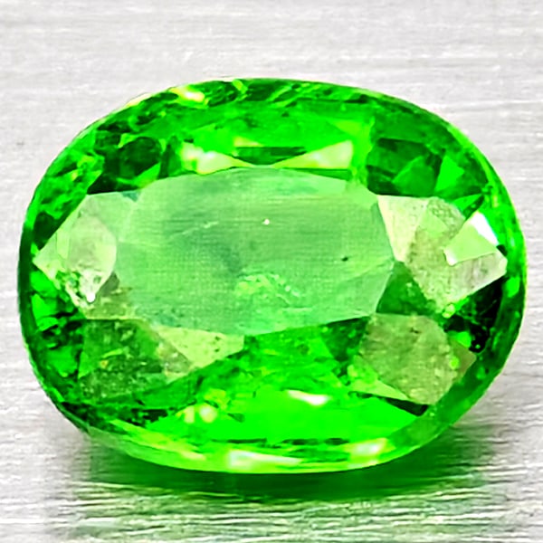 Natural Green Tsavorite Garnet Gemstones 0.51 Ct. Oval Shape 5 x 4 Mm.: Product ID: 802937041 Product Name: Natural Tsavorite Weight: 0.51 CT. Size: 5 x 4 x 2.6 MM. Shape: Oval Shape Color: Green Clarity:SI1 Luster: Good Gems Origin: Tanzania Treatment: Unheated Crystal S