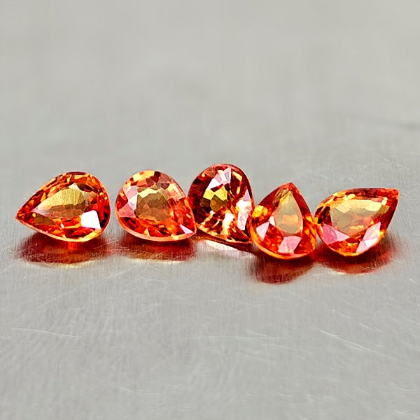 Natural Orange Red Songea Sapphire 1.97 Ct. 5 Pcs. Pear Shape 5.2 x 4.2 Mm.: Product ID: 806161882 Product Name: Natural Orange Sapphire Weight: 1.97 CT. Size: 5.1 x 4 x 2.2 MM. Shape: Pear Color: Orange Red Songea Clarity:VVS Luster: Very Good Gems Origin: Tanzania Treatment:
