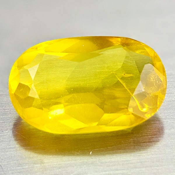 Natural Yellow Opal Gemstones 3.93 Ct. Oval Shape 14.6 x 9.2 Mm.: Product ID: 818727780 Product Name: Natural Opal Weight: 3.93 CT. Size: 14.6 x 9.2 x 5.5 MM. Shape: Oval Color: Yellow Clarity:VSI Luster: Good Gems Origin: Mexico Treatment: Unheated Crystal Structur