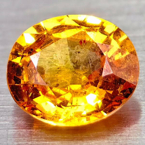 Natural Yellow Spessatite Garnet Oval Shape 6.3 X 5.5 Mm.: Product ID: 102908212 Product Name: Natural Spessartine Weight: 0.95 CT. Size: 6.3 X 5.5 X 3 MM. Shape: Oval Color: Fanta Orange Clarity:VSI Luster: Good Gems Origin: Nigeria Treatment: Unheated Cryst