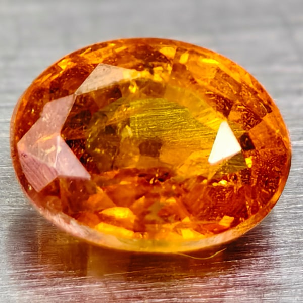 Natural Orange Spessartine Garnet 0.61 Ct. Oval Shape 4 X 5 Mm.: Product ID: 102901870 Product Name: Natural Spessartine Weight: 0.61 CT. Size: 4 X 5 X 3.7 MM. Shape: OVAL Color: ORANGE Clarity:EYE CLEAN Luster: EXCELLENT Gems Origin: NIGERIA Treatment: UNHEATED Cr