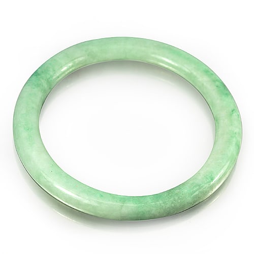 Natural Green Jade Bangle 178.78 Ct. Diameter 57 Mm.: Product ID: 819812358 Product Name: Natural Jade Weight: 178.78 CT. Size: 75 x 57 x 7 MM. Shape: Round Cabochon Color: Green White Clarity:Opaque Luster: Good Gems Origin: Thailand Treatment: Unheated
