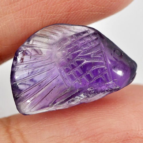 Natural Purple Amethyst Gemstones 6.80 Ct. Fish Carving Shape 17.6 x 11.3 Mm.: Product ID: 810303353 Product Name: Natural Amethyst Weight: 6.80 CT. Size: 17.6 x 11.3 x 6.2 MM. Shape: Fish Carving Color: Purple Clarity:Semi - Transparent Luster: Good Gems Origin: Brazil Treatmen
