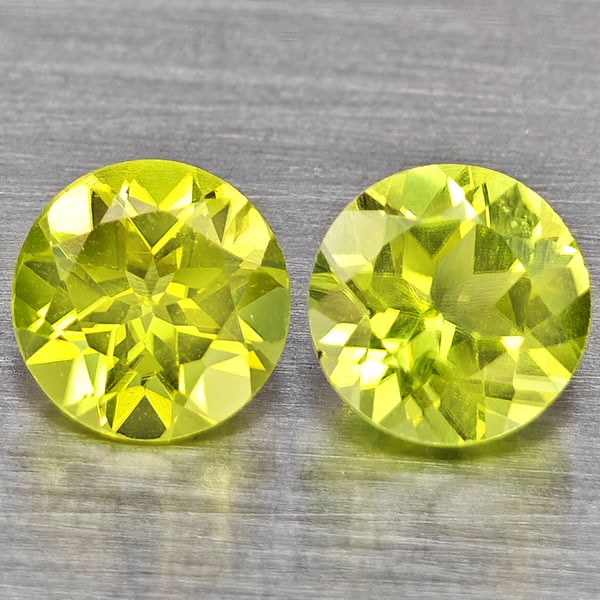 Natural Green Peridot Gemstones 1.31 Ct. 2 Pcs. Round Shape 5.1 Mm.: Product ID: 805317638 Product Name: Natural Peridot Weight: 1.31 CT. Size: 5.1 x 5.1 x 3.4 MM. Shape: Round Color: Green Clarity:VSI Luster: Good Gems Origin: Pakistan Treatment: Unheated Crystal Stru