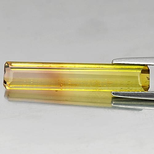 Natural Bi Color Tourmaline Gemstones 4.79 Ct. Octagon Shape 27 x 5 Mm.: Product ID: 807237823 Product Name: Natural Tourmaline Weight: 4.79 CT. Size: 27 x 5 x 3.5 MM. Shape: Octagon Color: Bi Color Clarity:VSI Luster: Good Gems Origin: Nigeria Treatment: Unheated Crystal 