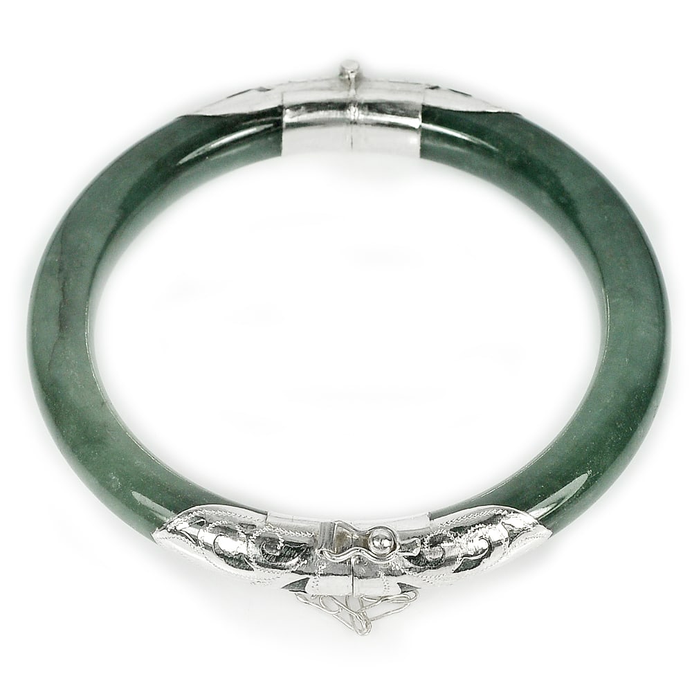 Natural Green Jade Gemstones Bangle 179.80 Ct. Diameter 57 Mm. with Silver Jewelry: Product ID: 819813954 Product Name: Natural Jade Weight: 179.80 CT. Size: 72 x 57 x 9 MM. Shape: Round Cabochon Color: Green Clarity:Opaque Luster: Good Gems Origin: Thailand Treatment: Unheated Cryst