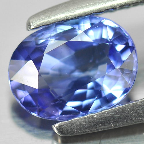 Natural Blue Tanzanite Gemstones 1.08 Ct Oval Shape 7.6 x 5.8 Mm.: Product ID: 807006489 Product Name: Natural Tanzanite Weight: 1.08 CT. Size: 7.6 x 5.8 x 3.4 MM. Shape: Oval Color: Blue Clarity:VSI Luster: Good Gems Origin: Tanzania Treatment: Heated Crystal Struct