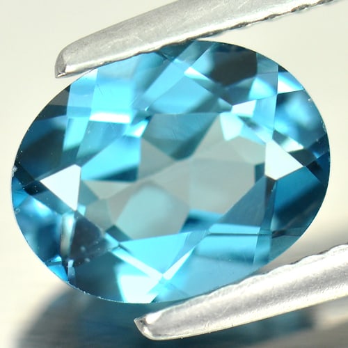 Natural London Blue Topaz Gemstones 2.17 Ct. Oval Shape 9.2 x 7.1 Mm.: Product ID: 807162134 Product Name: Natural Blue Topaz Weight: 2.17 CT. Size: 9.2 x 7.1 x 4.5 MM. Shape: Oval Color: London Blue Clarity:VVS Luster: Good Gems Origin: Brazil Treatment: Treated Crystal