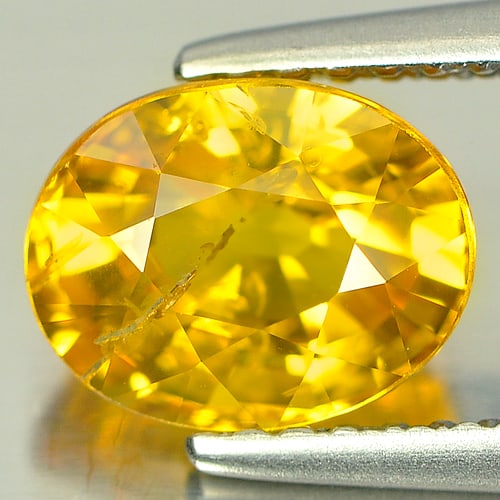Natural Yellow Sapphire Gemstone Gemstones 2.30 Ct. Oval Shape 8 x 6.3 Mm.: Product ID: 806140003 Product Name: Natural Yellow Sapphire Weight: 2.30 CT. Size: 8 x 6.3 x 5 MM. Shape: Oval Color: Yellow Clarity:SI Luster: Good Gems Origin: Thailand Treatment: Heated Crystal Str