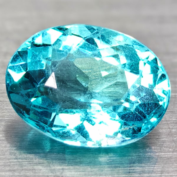 Natural Paraiba Color Apatite Tanzania 1.49 Ct. Oval Shape 8 x 6 Mm.: Product ID: 100602050 Product Name: Natural Apatite Weight: 1.49 CT. Size: 8 x 6 x 4.5 MM. Shape: Oval Color: Neon Blue Clarity:SI Luster: Good Gems Origin: Tanzania Treatment: Unheated Crystal Struct