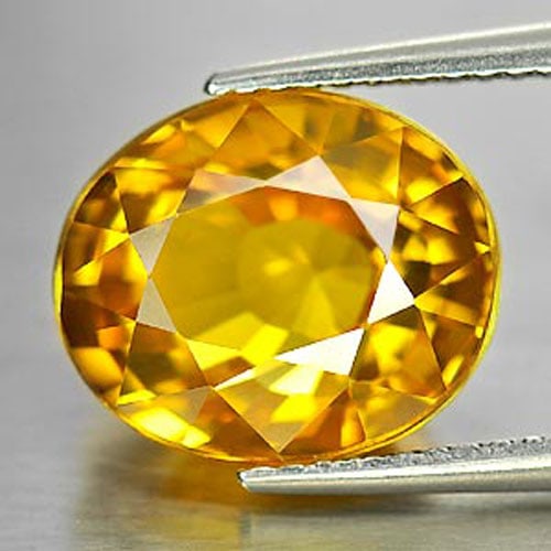 Natural Yellow Zircon Gemstones 10.01 Ct. Oval Shape 12 x 10 Mm.: Product ID: 807726516 Product Name: Natural Zircon Weight: 10.01 CT. Size: 12 x 10 x 7.1 MM. Shape: Oval Color: Yellow Clarity:VVS Luster: Very Good Gems Origin: Cambodia Treatment: Heated Crystal Str