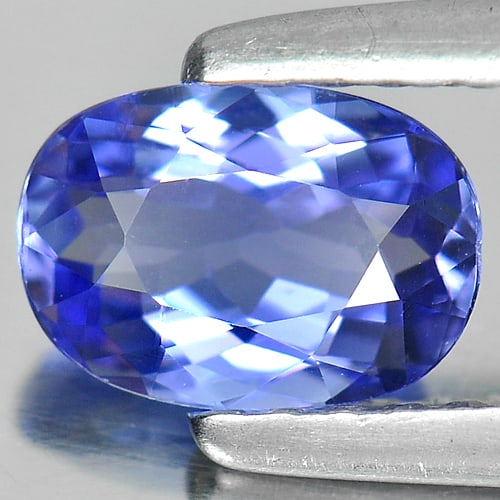 Natural Blue Tanzanite Gemstones 0.69 Ct. Oval Shape 6.7 x 4.7 Mm.: Product ID: 807004759 Product Name: Natural Tanzanite Weight: 0.69 CT. Size: 6.7 x 4.7 x 2.9 MM. Shape: Oval Color: Violet Blue Clarity:VVS Luster: Good Gems Origin: Tanzania Treatment: Heated Crystal