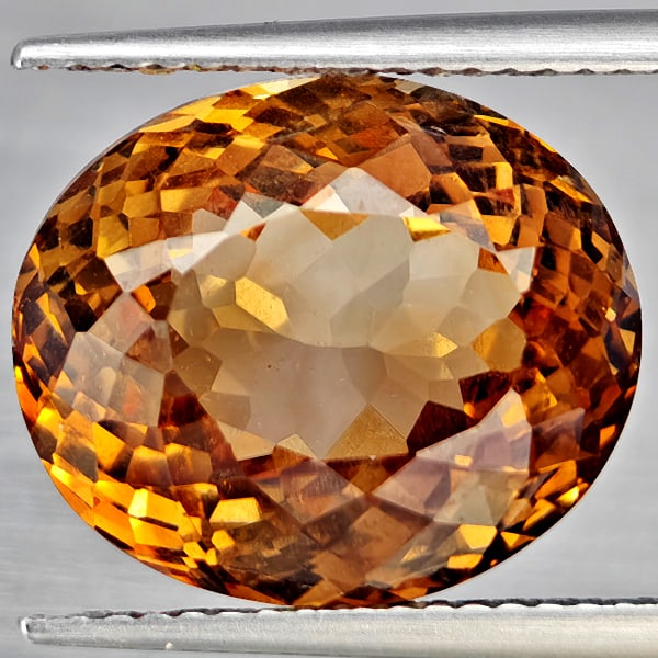 Natural Imperial Topaz Gemstones 13.66 Ct. Oval Shape 14.4 x 12.2 Mm.: Product ID: 807168604 Product Name: Natural Topaz Weight: 13.66 CT. Size: 14.4 x 12.2 x 9.5 MM. Shape: Oval Shape Color: Imperial Clarity:VVS Luster: Very Good Gems Origin: Brazil Treatment: Treated C