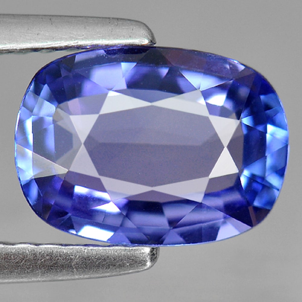 Natural Blue Tanzanite Gemstones 1.63 Ct. Clean Cushion Shape 8.2 x 5.7 Mm.: Product ID: 807006558 Product Name: Natural Tanzanite Weight: 1.63 CT. Size: 8.2 x 5.7 x 2.6 MM. Shape: Cushion Color: Violetish Blue Clarity:IF Luster: Very Good Gems Origin: Tanzania Treatment: Heat