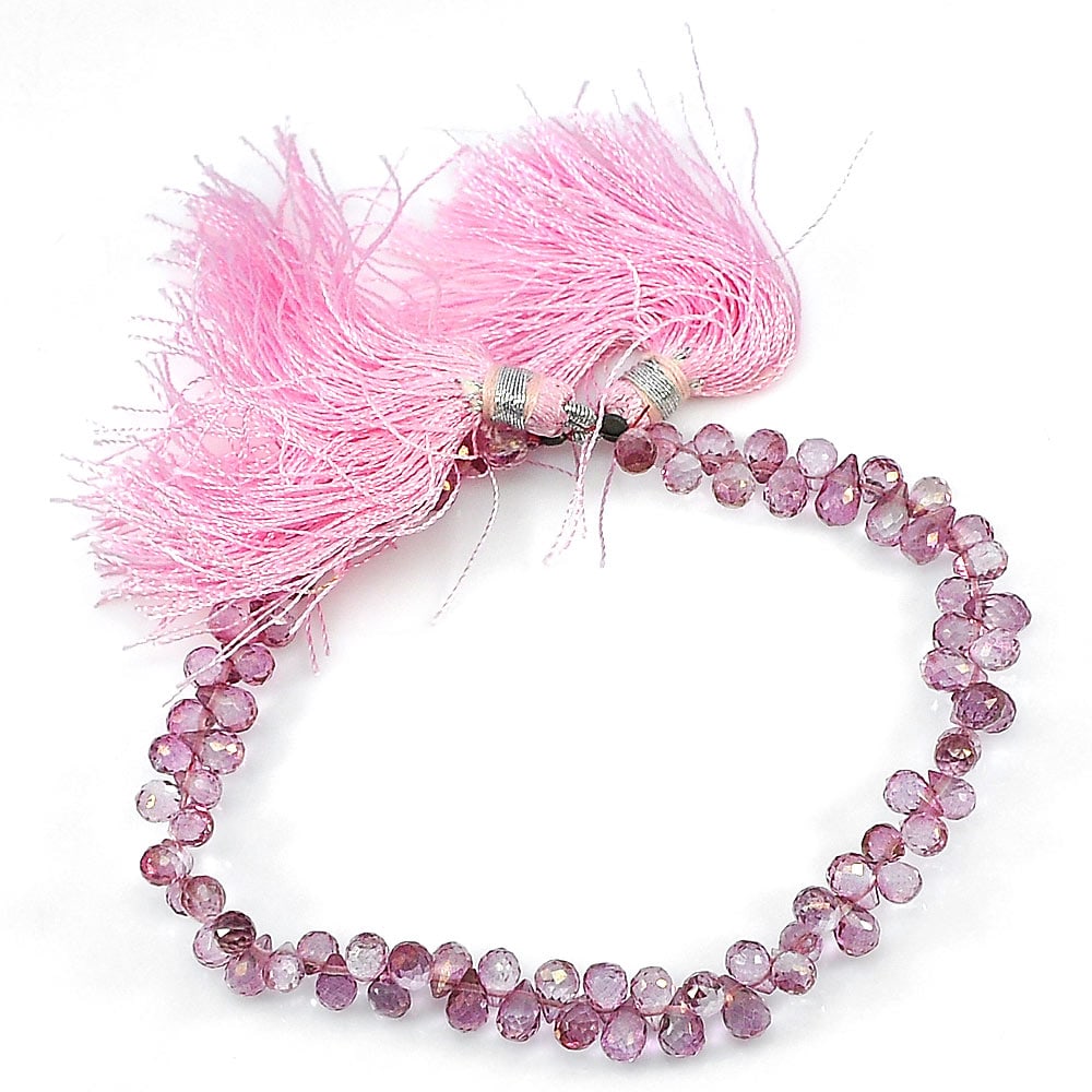 Natural Pink Topaz Gemstones Beads 68.85 Ct. Briolette Shape Length 8 Inch: Product ID: 807136414 Product Name: Natural Topaz Weight: 68.85 CT. Size: 8 Inch / 6.5 x 4.1 x 4.1 MM. Shape: Briolette With Drilled Color: Pink Clarity:IF - VVS Luster: Good Gems Origin: Brazil Treat