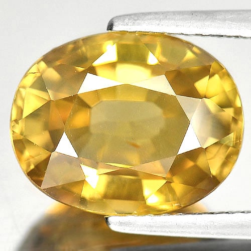 Natural Yellow Zircon Gemstones 7.04 Ct. Oval Shape 12.2 x 9.7 Mm.: Product ID: 807730620 Product Name: Natural Zircon Weight: 7.04 CT. Size: 12.2 x 9.7 x 5.5 MM. Shape: Oval Color: Yellow Clarity:VVS Luster: Very Good Gems Origin: Cambodia Treatment: Heated Crystal S