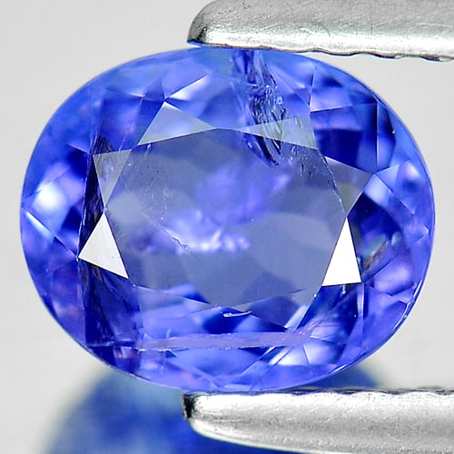 Natural Blue Tanzanite Gemstones 1.31 Ct. Oval Shape 7.3 x 6.1 Mm.: Product ID: 807004060 Product Name: Natural Tanzanite Weight: 1.31 CT. Size: 7.3 x 6.1 x 3.7 MM. Shape: Oval Color: Blue Clarity:SI Luster: Good Gems Origin: Tanzania Treatment: Heated Crystal Structu