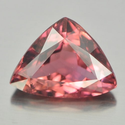 Natural Orangish Pink Tourmaline Gemstones 1.02 Ct. Trilliant Shape 6.1 x 5.8 Mm.: Product ID: 807246102 Product Name: Natural Tourmaline Weight: 1.02 CT. Size: 6.1 x 5.8 x 3.7 MM. Shape: Trilliant Color: Orangish Pink Clarity:SI1 Luster: Good Gems Origin: Nigeria Treatment: Unheate