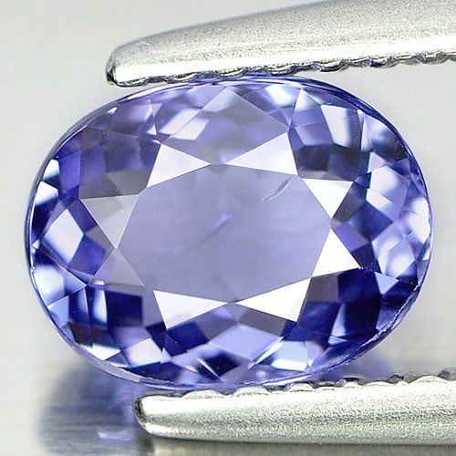 Natural Blue Tanzanite Gemstones 0.97 Ct. Oval Shape 6.9 x 5.3 Mm.: Product ID: 807004542 Product Name: Natural Tanzanite Weight: 0.97 CT. Size: 6.9 x 5.3 x 3.4 MM. Shape: Oval Color: Violetish Blue Clarity:VSI Luster: Very Good Gems Origin: Tanzania Treatment: Heated
