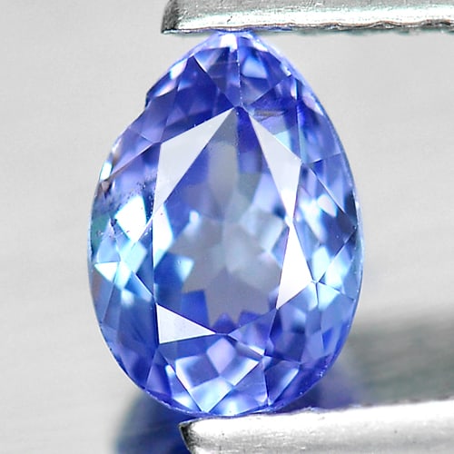 Natural Blue Tanzanite Gemstones 0.77 Ct. Pear Shape 6.7 x 4.8 Mm.: Product ID: 807004774 Product Name: Natural Tanzanite Weight: 0.77 CT. Size: 6.7 x 4.8 x 3.5 MM. Shape: Pear Color: Violet Blue Clarity:VSI Luster: Good Gems Origin: Tanzania Treatment: Heated Crystal