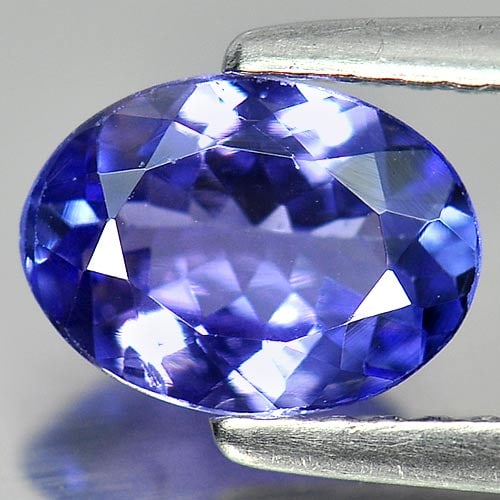 Natural Blue Tanzanite Gemstones 1.10 Ct. Oval Shape 8 x 5.8 Mm.: Product ID: 807009053 Product Name: Natural Tanzanite Weight: 1.10 CT. Size: 8 x 5.8 x 3.2 MM. Shape: Oval Color: Blue Clarity:VSI Luster: Very Good Gems Origin: Tanzania Treatment: Heated Crystal Str