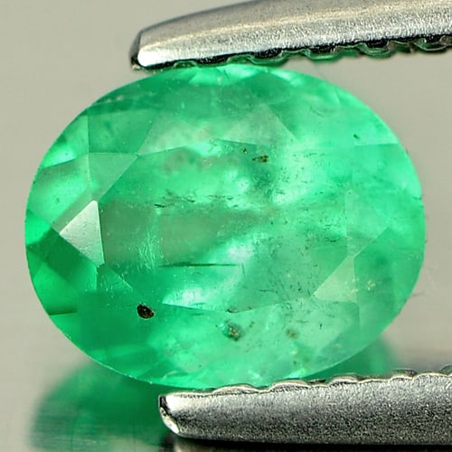 Natural Green Emerald Gemstones 0.62 Ct. Oval Shape 6 x 5 Mm.: Product ID: 802403558 Product Name: Natural Emerald Weight: 0.62 CT. Size: 6 x 5 x 4 MM. Shape: Oval Color: Green Clarity:VSI Luster: Good Gems Origin: Columbia Treatment: Unheated Crystal Structure: 