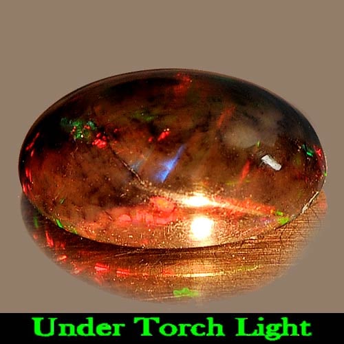 Natural Play Of Color Rainbow Fire Red Black Opal Gemstones 1.30 Ct. Oval Cabochon Shape 10.4 x 6.9: Product ID: 818724639 Product Name: Natural Opal Weight: 1.30 CT. Size: 10.4 x 6.9 x 4 MM. Shape: Oval Cabochon Color: Multi-Color Clarity:Semi - Transparent Luster: Iridescent Gems Origin: Ethiopia T