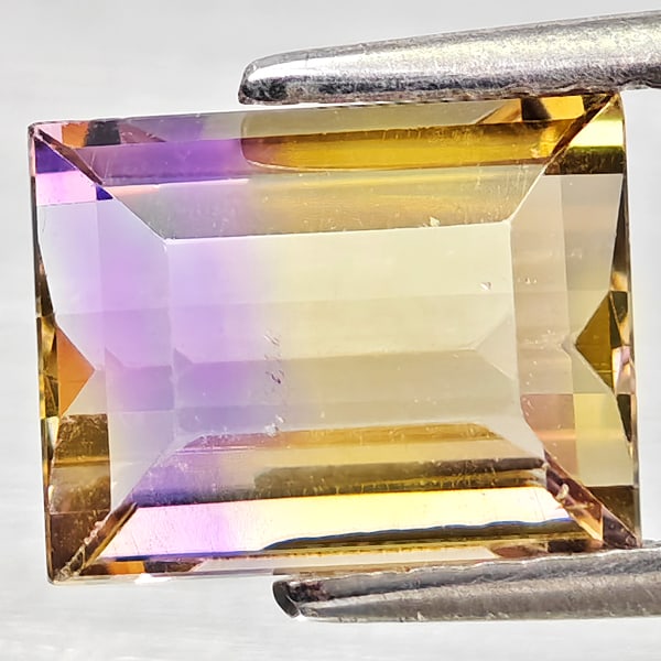 Natural Bi Color Ametrine Gemstones 2.31 Ct. Octagon Shape 8.7 x 6.8 Mm.: Product ID: 800408382 Product Name: Natural Ametrine Weight: 2.31 CT. Size: 8.7 x 6.8 x 5 MM. Shape: Octagon Color: Bi Color Clarity:VSI - SI1 Luster: Good Gems Origin: Bolivia Treatment: Unheated Cry