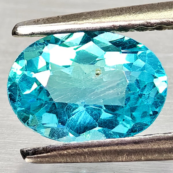 Natural Paraiba Color Apatite Gemstones 0.79 Ct. Oval Shape 7.1 x 5.1 Mm.: Product ID: 800613701 Product Name: Natural Apatite Weight: 0.79 CT. Size: 7.1 x 5.1 x 3.2 MM. Shape: Oval Color: Neon Blue Clarity:VSI Luster: Good Gems Origin: Tanzania Treatment: Unheated Crystal S