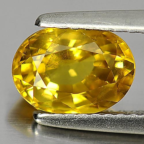 Natural Yellow Sapphire Gemstones 2.05 Ct. Oval Shape 8.4 x 6.1 Mm.: Product ID: 806153018 Product Name: Natural Yellow Sapphire Weight: 2.05 CT. Size: 8.4 x 6.1 x 4.6 MM. Shape: Oval Color: Yellow Clarity:VSI Luster: Good Gems Origin: Thailand Treatment: Heated Crysta