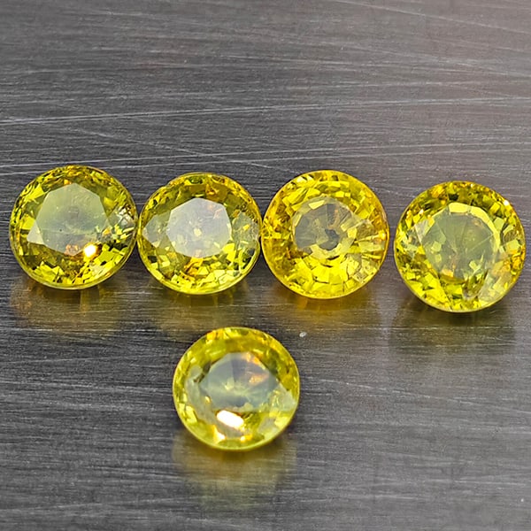 Natural Greenish Yellow Titanium Sphene Gemstones Rainbow Spark 2.08 Ct. 5 Pcs Round Shape 4.2 Mm.: Product ID: 806509376 Product Name: Natural Sphene Weight: 2.08 CT. Size: 4.2 x 4.2 x 2.4 MM. Shape: Round Color: Greenish Yellow Clarity:SI1 Luster: Good Gems Origin: Madagascar Treatment: Unheated C