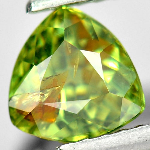 Natural Green Demantoid Garnet Gemstones 1.25 Ct. Trilliant Shape 6.3 x 6.2 Mm.: Product ID: 802922466 Product Name: Natural Demantoid Weight: 1.25 CT. Size: 6.3 x 6.2 x 4.2 MM. Shape: Trilliant Color: Green Clarity:SI Luster: Good Gems Origin: Mardagascar Treatment: Unheated Crys