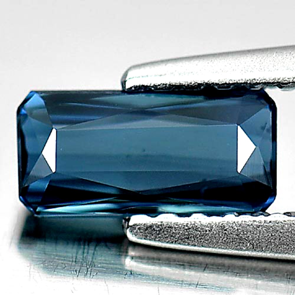 Natural Blue Indicolite Tourmaline Gemstones 0.56 Ct. Octagon Shape 7.2 x 3.5 Mm.: Product ID: 807239794 Product Name: Natural Tourmaline Weight: 0.56 CT. Size: 7.2 x 3.5 x 2.2 MM. Shape: Octagon Color: Blue Indicolite Clarity:VSI Luster: Very Good Gems Origin: Nigeria Treatment: Un