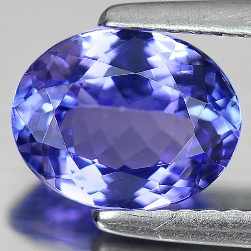 Natural Blue Tanzanite Gemstones 1.48 Ct. VVS Oval Shape 8.2 x 6.5 Mm.: Product ID: 807009043 Product Name: Natural Tanzanite Weight: 1.48 CT. Size: 8.2 x 6.5 x 3.7 MM. Shape: Oval Color: Violetish Blue Clarity:VVS Luster: Good Gems Origin: Tanzania Treatment: Heated Crys