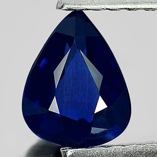 Natural Blue Sapphire Gemstones 0.79 Ct. Pear Shape 6.7 x 5.3 Mm.: Product ID: 806009277 Product Name: Natural Blue Sapphire Weight: 0.79 CT. Size: 6.7 x 5.3 x 3.1 MM. Shape: Pear Color: Blue Clarity:VS Luster: Good Gems Origin: Thailand Treatment: Heated Crystal Str