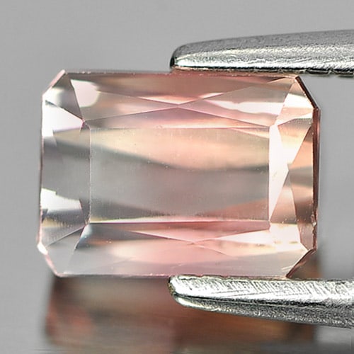 Natural Party Color Tourmaline Gemstones 1.15 Ct. Octagon Shape 6.6 x 5 Mm.: Product ID: 807244154 Product Name: Natural Tourmaline Weight: 1.15 CT. Size: 6.6 x 5 x 3.7 MM. Shape: Octagon Color: Party Color Clarity:SI1 Luster: Good Gems Origin: Nigeria Treatment: Unheated Crys