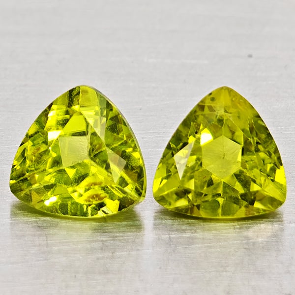 Natural Green Peridot Gemstones 1.88 Ct. 2 Pcs Trilliant Shape 6.1 Mm.: Product ID: 805317535 Product Name: Natural Peridot Weight: 1.88 CT. Size: 6.1 x 6.1 x 4 MM. Shape: Trilliant Color: Green Clarity:SI1 Luster: Good Gems Origin: Pakistan Treatment: Unheated Crystal St