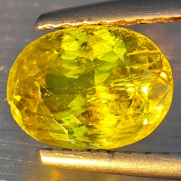 Natural Multi-Color With Rainbow Spark Sphene Gemstones 1.15 Ct. Oval Shape 7.8 x 6.9 Mm.: Product ID: 806509181 Product Name: Natural Sphene Weight: 1.15 CT. Size: 7.8 x 6.9 x 4.2 MM. Shape: Oval Shape Color: Multi-Color Clarity:SI1 Luster: Good Gems Origin: Madagascar Treatment: Unheated 